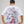 Camiseta CHILL oversize boxy fit blanca — algodón con estampado emo-rap retrato artístico en serigrafía negro y rosa, streetwear hecho en Colombia