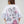 Camiseta CHILL oversize boxy fit blanca — algodón con estampado emo-rap retrato artístico en serigrafía negro y rosa, streetwear hecho en Colombia