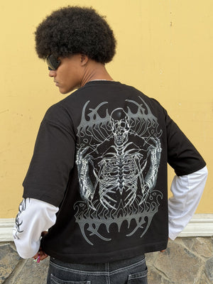 Camiseta manga larga Graveborn CHILL oversize distressed negra — algodón peinado con estampado tribal esqueleto en serigrafía, streetwear hecho en Colombia