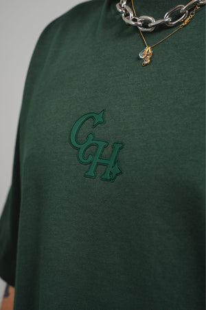 Camiseta Chill dinamita regular fit verde — algodón peruano 200gr con logo en relieve serigrafía tono sobre tono, streetwear minimalista hecho en Colombia
