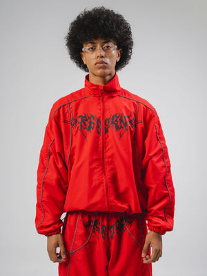 Chaqueta Reborn CHILL roja boxy fit — antifluido con detalles reflectivos y estampado tribal serigrafía, streetwear hecho en Colombia