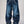 Jeans baggy CHILL azul washed — denim con bordes deshilachados curvos y bordado tribal, streetwear hecho en Colombia
