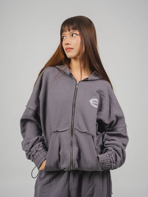 Hoodie Lace CHILL gris oversize 400gr — algodón con doble cierre YKK y detalles raw edge deconstruidos, streetwear hecho en Colombia