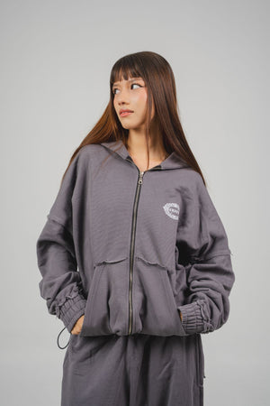 Hoodie Lace CHILL gris oversize 400gr — algodón con doble cierre YKK y detalles raw edge deconstruidos, streetwear hecho en Colombia