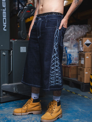 Jorts CHILL azul raw denim — bermuda baggy con estampado tribal serigrafía, streetwear hecho en Colombia