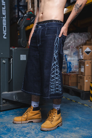 Jorts CHILL azul raw denim — bermuda baggy con estampado tribal serigrafía, streetwear hecho en Colombia