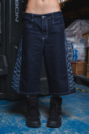 Jorts CHILL azul raw denim — bermuda baggy con estampado tribal serigrafía, streetwear hecho en Colombia