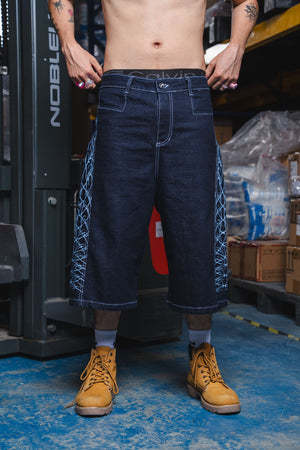 Jorts CHILL azul raw denim — bermuda baggy con estampado tribal serigrafía, streetwear hecho en Colombia