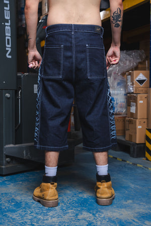 Jorts CHILL azul raw denim — bermuda baggy con estampado tribal serigrafía, streetwear hecho en Colombia