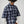 Leñadora Under The Sky CHILL azul boxy fit unisex — camisa a cuadros con doble manga blanca, golondrinas y lettering script en serigrafía, streetwear hecho en Colombia