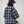 Leñadora Under The Sky CHILL azul boxy fit unisex — camisa a cuadros con doble manga blanca, golondrinas y lettering script en serigrafía, streetwear hecho en Colombia