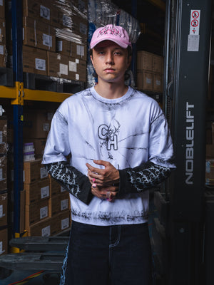 Camiseta manga larga oversize distressed CHILL — algodón pesado con estampado tribal serigrafía, streetwear hecho en Colombia