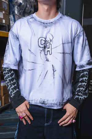 Camiseta manga larga oversize distressed CHILL — algodón pesado con estampado tribal serigrafía, streetwear hecho en Colombia