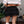 Miniskirt Bloom CHILL negro — algodón 300gr con triple capa de golas deshilachadas y licra incorporada, minifalda femenina streetwear hecha en Colombia
