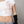 Top off shoulder Bellakita CHILL blanco cropped — algodón spandex con manga asimétrica y lettering script en serigrafía roja, top femenino streetwear hecho en Colombia