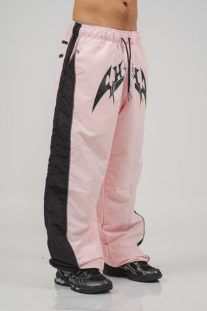 Parachute Track CHILL rosa — pantalón baggy antifluido con estampado tribal, streetwear colombiano