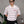 Polo Chillcore boxy fit CHILL rosa rayado unisex — algodón poliéster retro con cuello polo blanco y logo tribal en serigrafía roja, streetwear hecho en Colombia