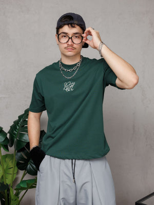Camiseta regular fit CH Goth CHILL verde unisex — 100% algodón peruano 250gr con monograma gótico CH en serigrafía azul marino, básico premium streetwear hecho en Colombia