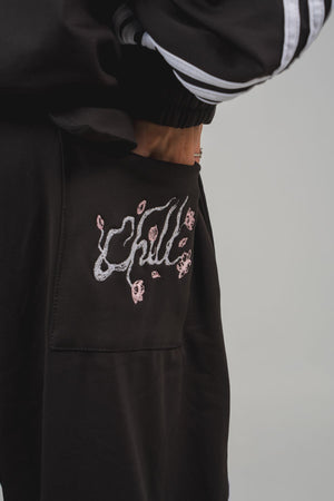 Sudadera Ondas CHILL azul marino baggy — tela scuba unisex con ondas en sesgo aéreo, ajustable en cintura y botas, streetwear hecho en Colombia