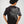 Camiseta Crimson Eyes CHILL oversize negra — algodón peruano 250gr con bestia tribal gris y ojos carmesí en serigrafía de espalda a manga, streetwear hecho en Colombia (