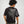 Camiseta Crimson Eyes CHILL oversize negra — algodón peruano 250gr con bestia tribal gris y ojos carmesí en serigrafía de espalda a manga, streetwear hecho en Colombia (